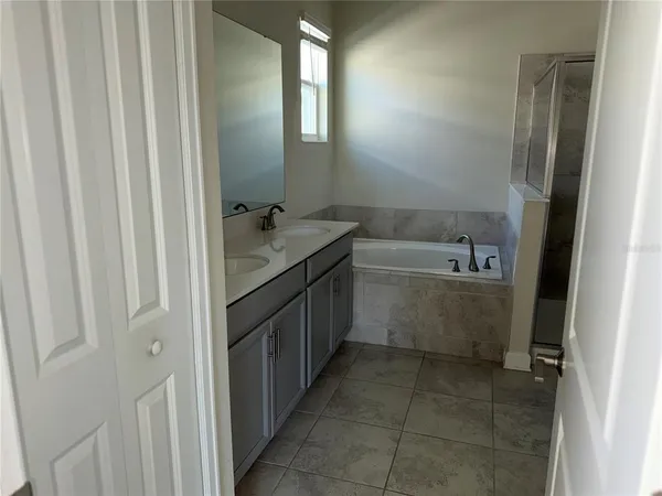 a close up of a bathtub in a bathroom