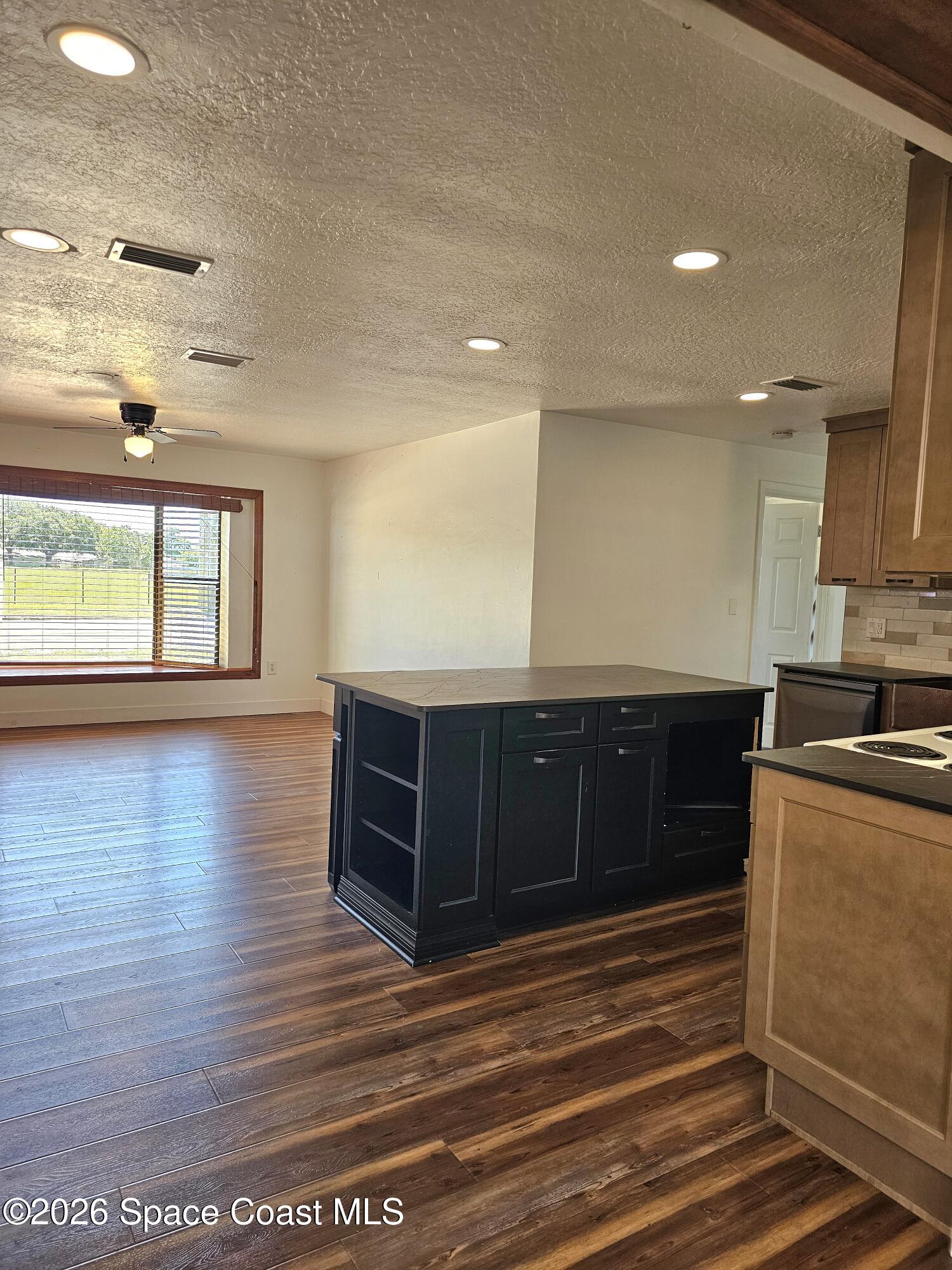 1508 Croton Road Melbourne, FL 32935 - Photo 5 of 14 Kitchen/Living Room