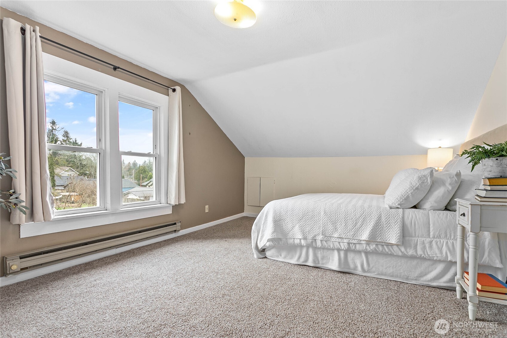 3820 Ohio Street Bellingham, WA 98229 - Photo 22 of 40 a bed sitting in a bedroom next to a window