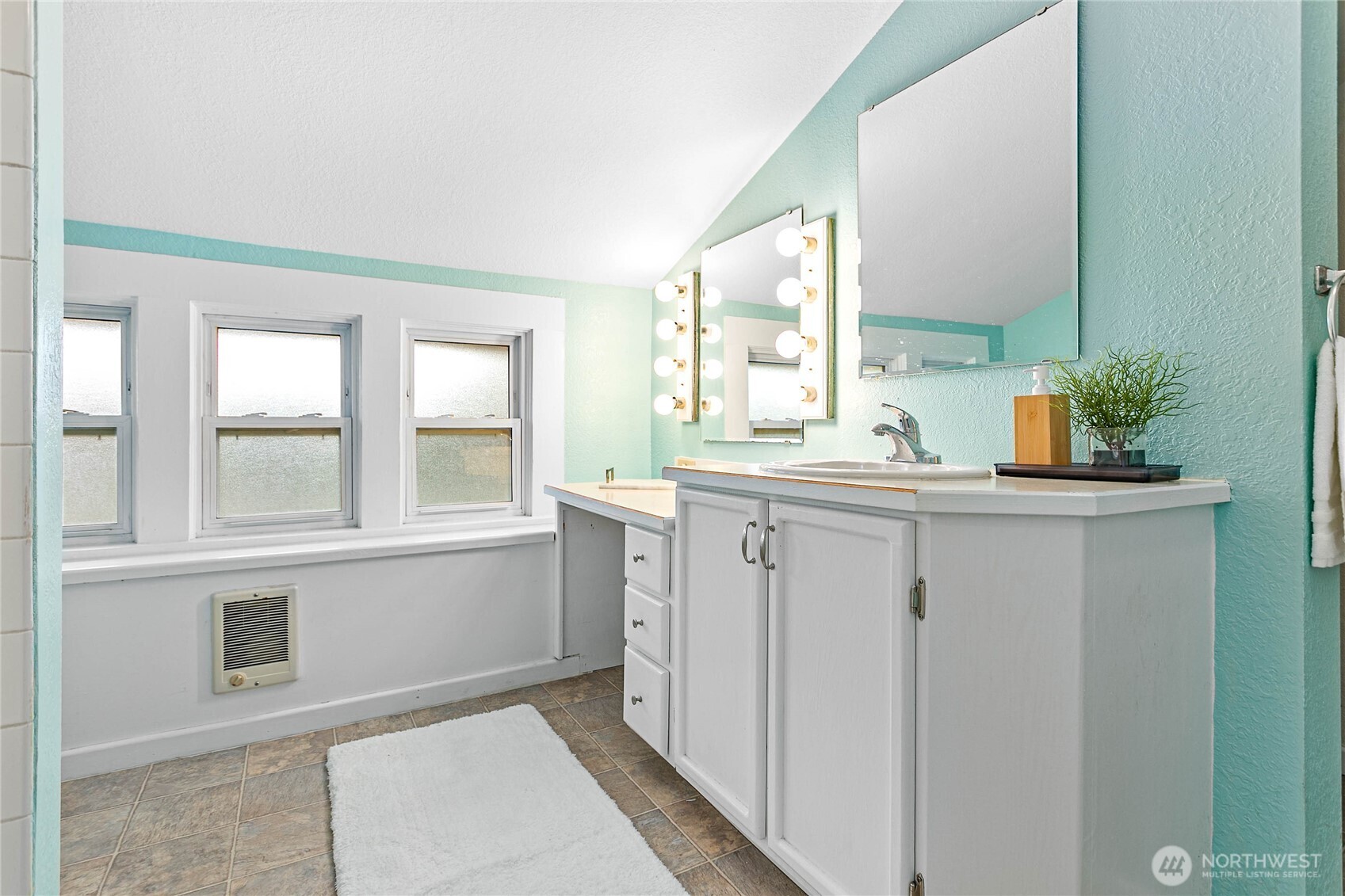3820 Ohio Street Bellingham, WA 98229 - Photo 23 of 40 a bathroom with a sink and a mirror