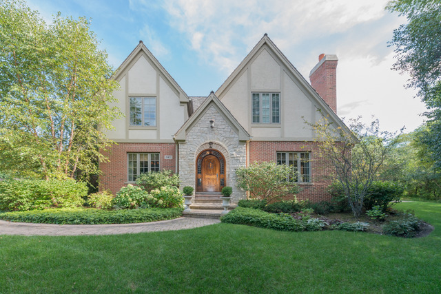 845 Walden Lane Lake Forest, IL 60045 - Photo 1 of 10 a front view of a house with a garden and plants