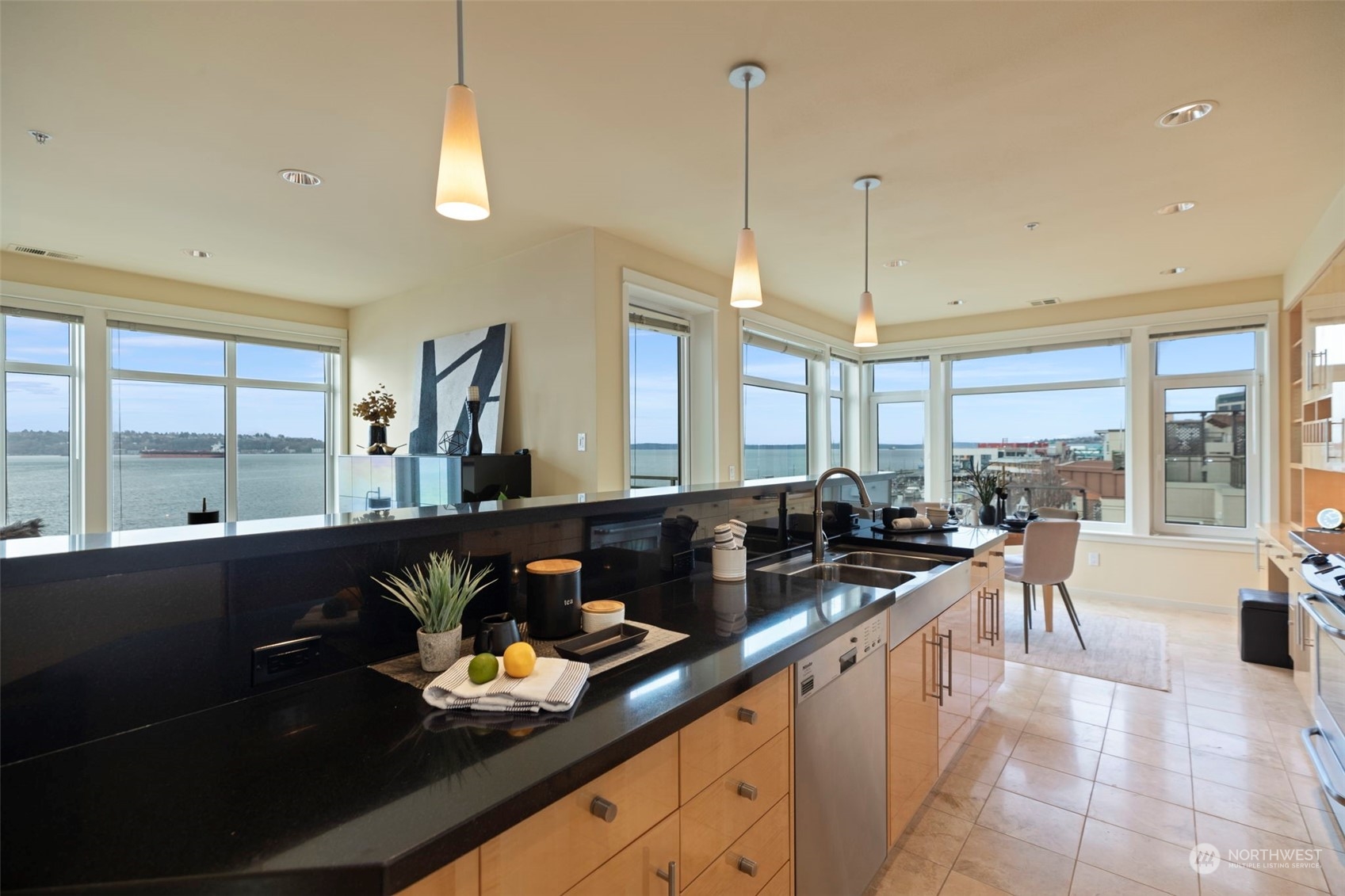 1900 Alaskan Way, Unit 516 Seattle, WA 98101 - Photo 15 of 40 a large kitchen with lots of counter space