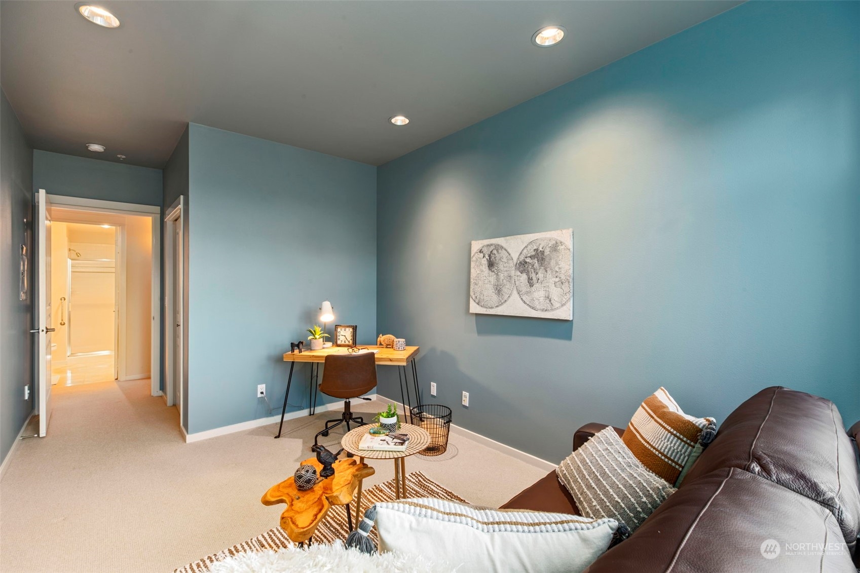 1900 Alaskan Way, Unit 516 Seattle, WA 98101 - Photo 22 of 40 a bed room with furniture and a window