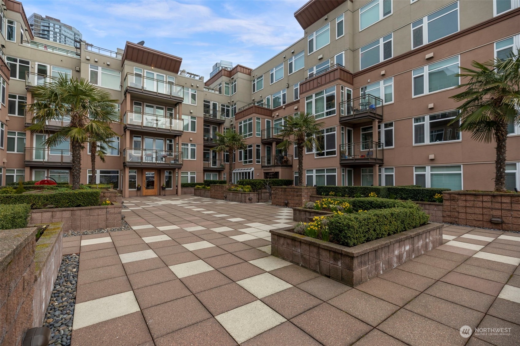 1900 Alaskan Way, Unit 516 Seattle, WA 98101 - Photo 31 of 40 a view of a building with many windows