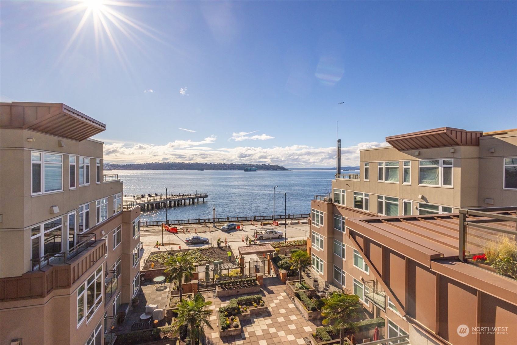 1900 Alaskan Way, Unit 516 Seattle, WA 98101 - Photo 33 of 40 a view of a balcony with an outdoor seating