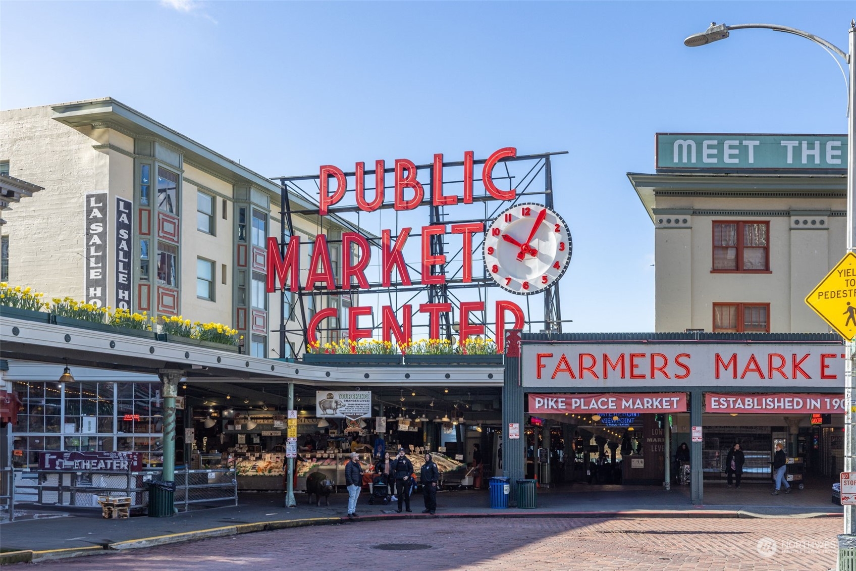 1900 Alaskan Way, Unit 516 Seattle, WA 98101 - Photo 39 of 40 a cafe on the corner of the street
