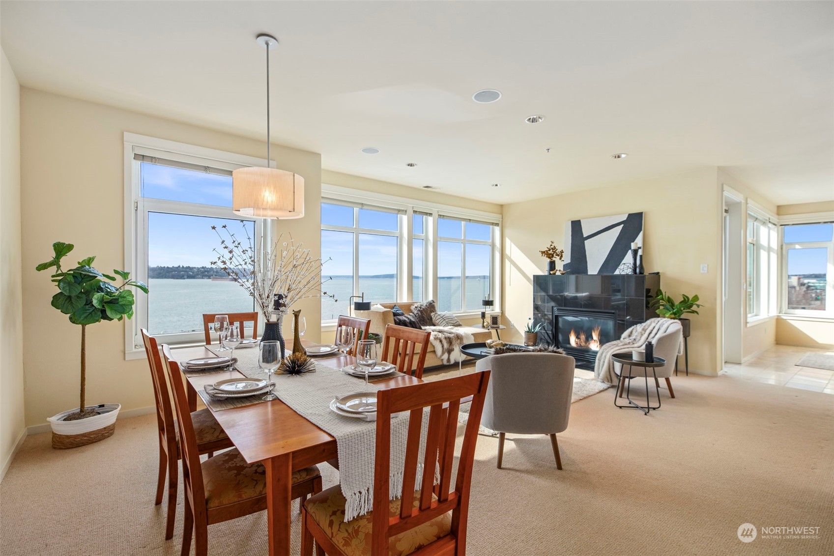 1900 Alaskan Way, Unit 516 Seattle, WA 98101 - Photo 7 of 40 a view of a dining room with furniture