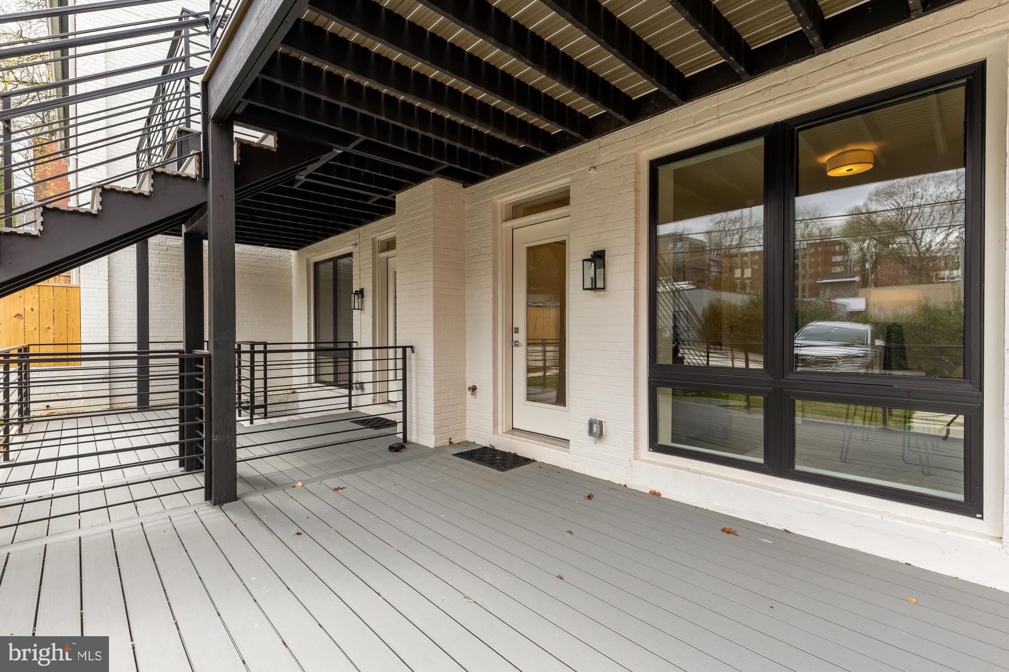 2647 41st Street Northwest, Unit 1 Washington, DC 20007 - Photo 15 of 32 a view of outdoor space with wooden floor and window