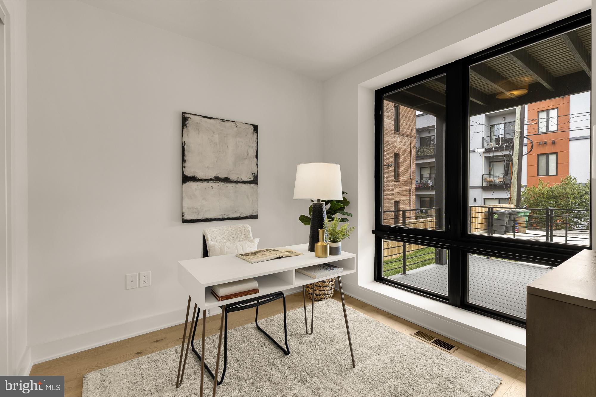 2647 41st Street Northwest, Unit 1 Washington, DC 20007 - Photo 16 of 32 a workspace with furniture and a window