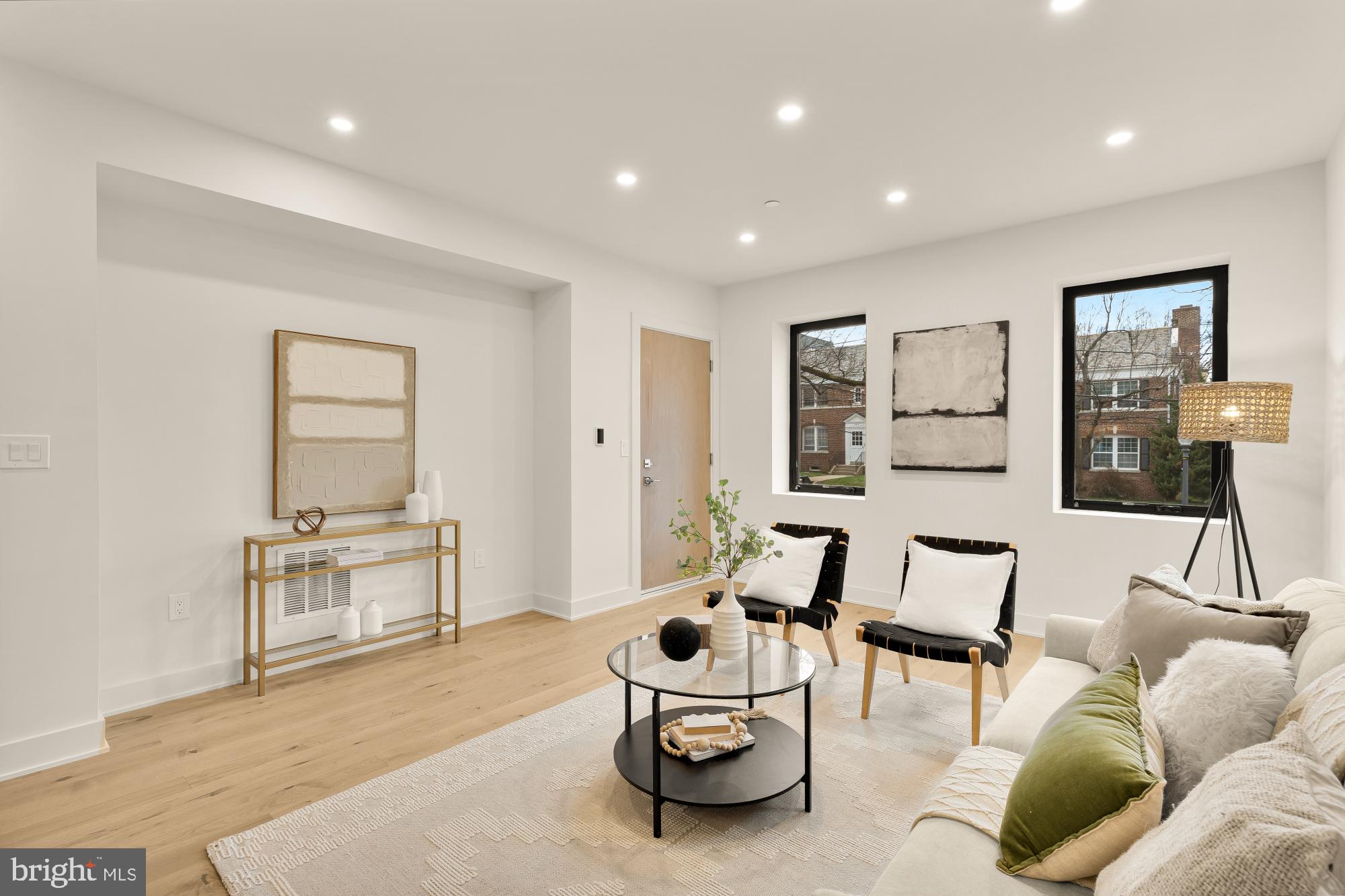 2647 41st Street Northwest, Unit 1 Washington, DC 20007 - Photo 2 of 32 a living room with furniture and a window