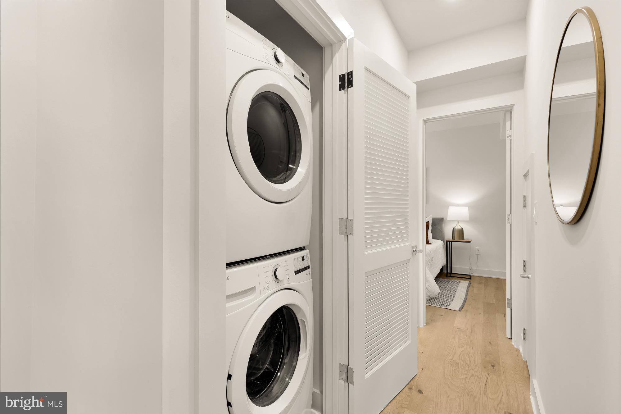 2647 41st Street Northwest, Unit 1 Washington, DC 20007 - Photo 30 of 32 a view of a hallway with washer and dryer
