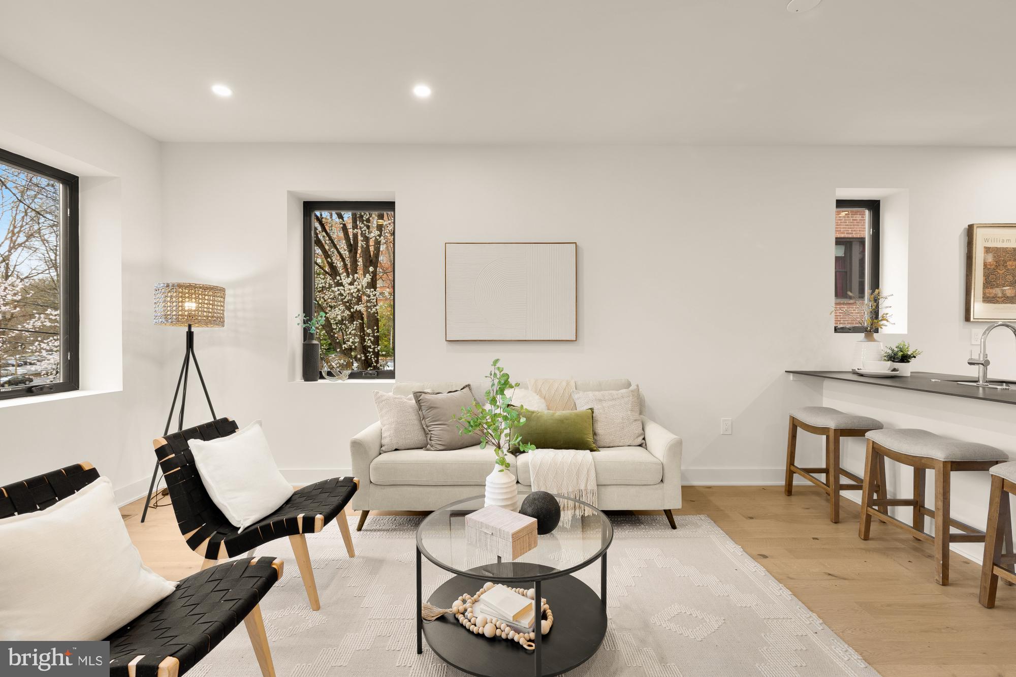 2647 41st Street Northwest, Unit 1 Washington, DC 20007 - Photo 3 of 32 a living room with furniture and wooden floor