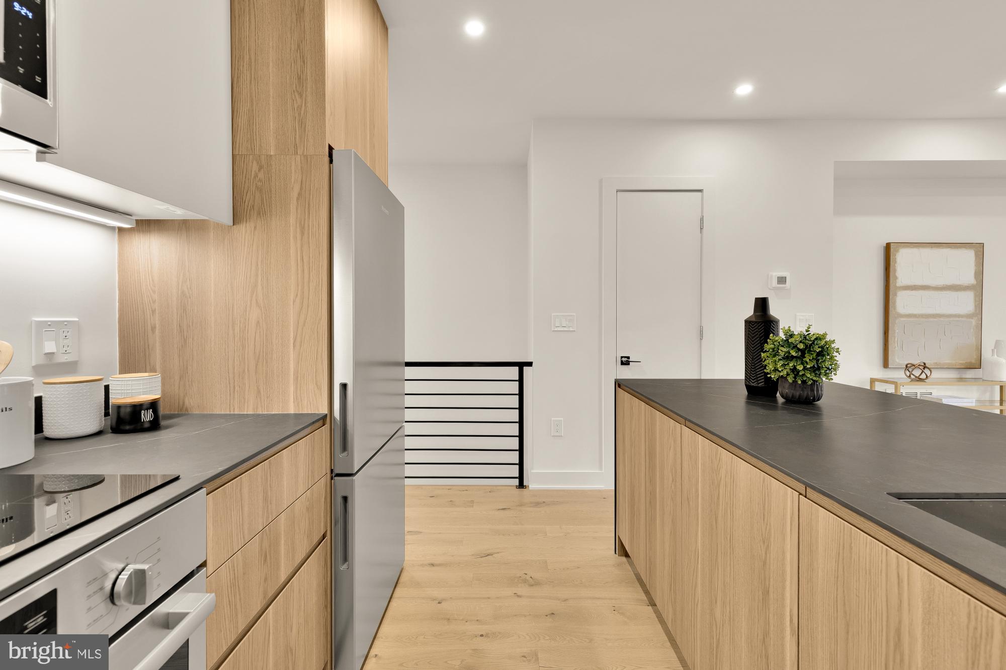 2647 41st Street Northwest, Unit 1 Washington, DC 20007 - Photo 10 of 32 a view of a kitchen cabinets and a counter place