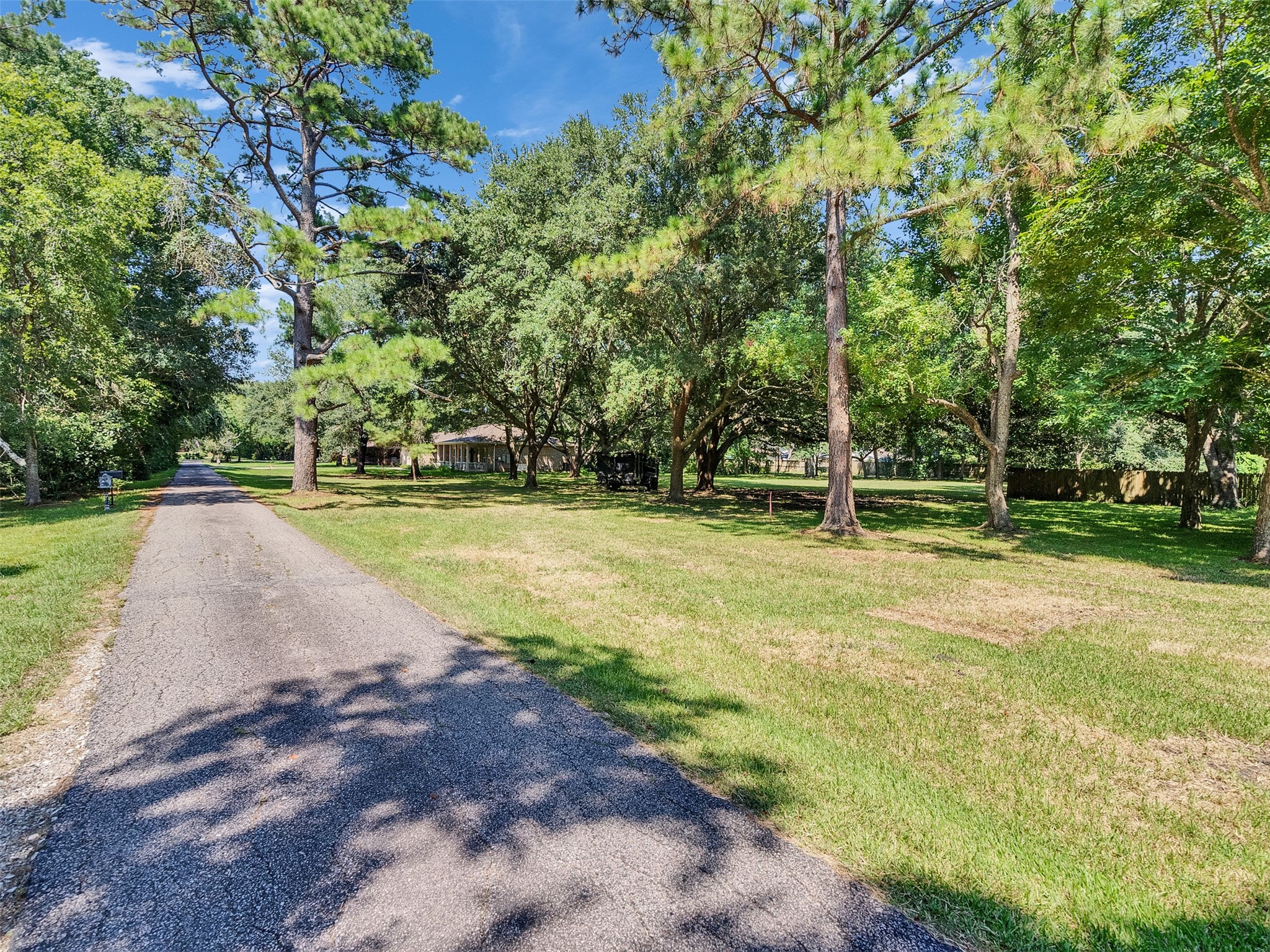 3147 Hughes Road Dickinson, TX 77539 - Photo 8 of 11 a view of a park with large trees