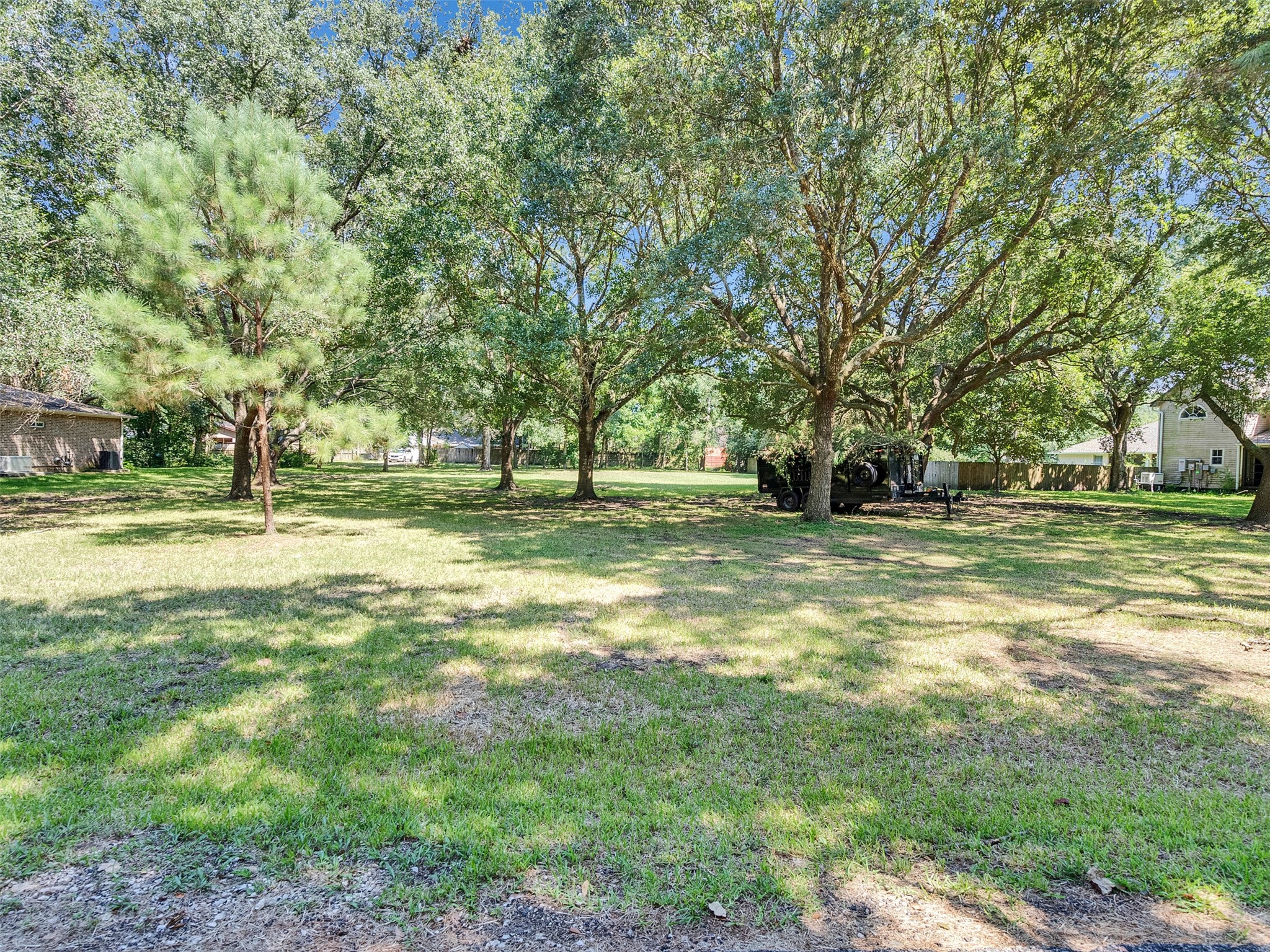 3147 Hughes Road Dickinson, TX 77539 - Photo 9 of 11 a view of a park with large trees
