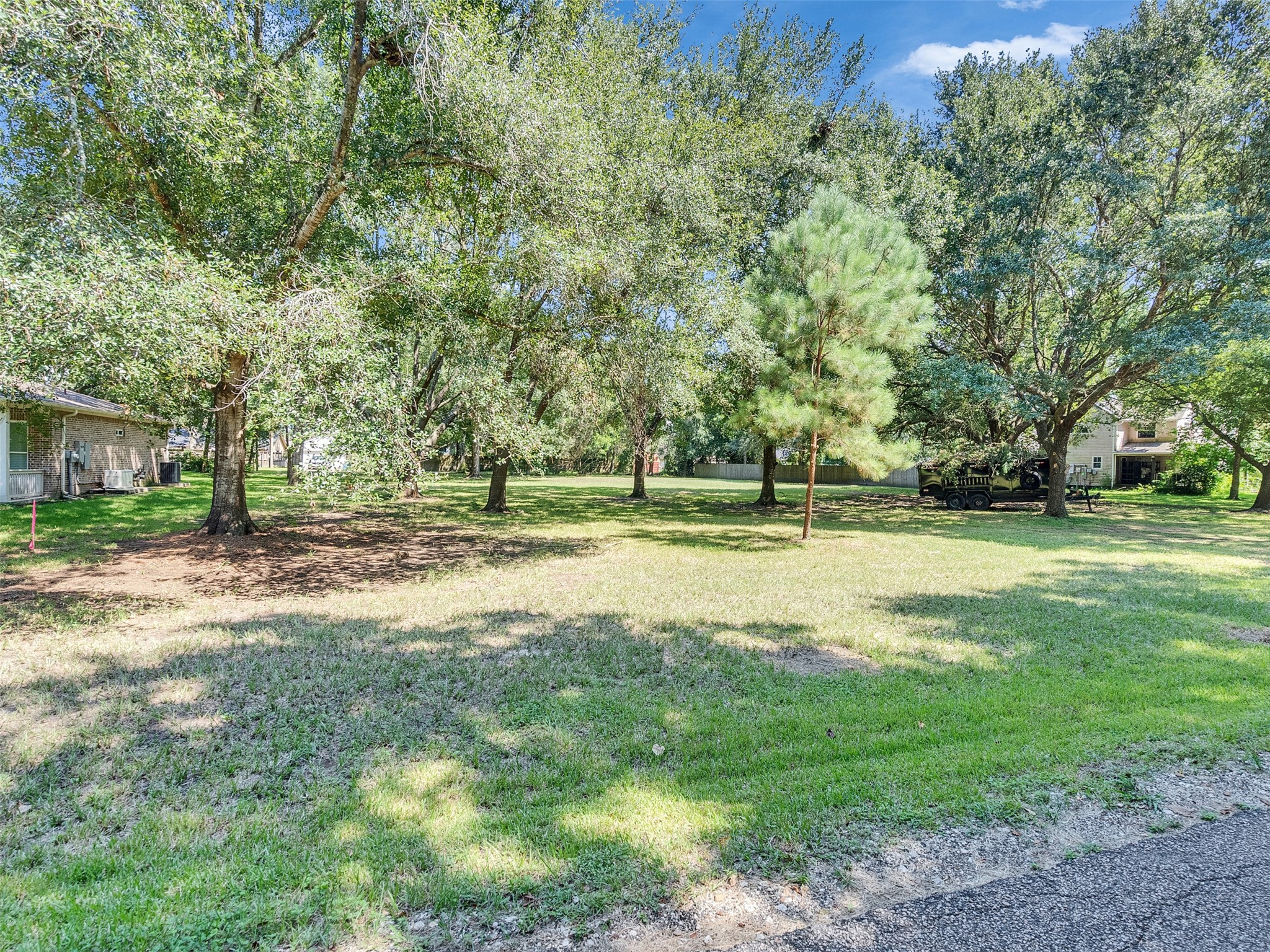 3147 Hughes Road Dickinson, TX 77539 - Photo 10 of 11 a view of a park with large trees