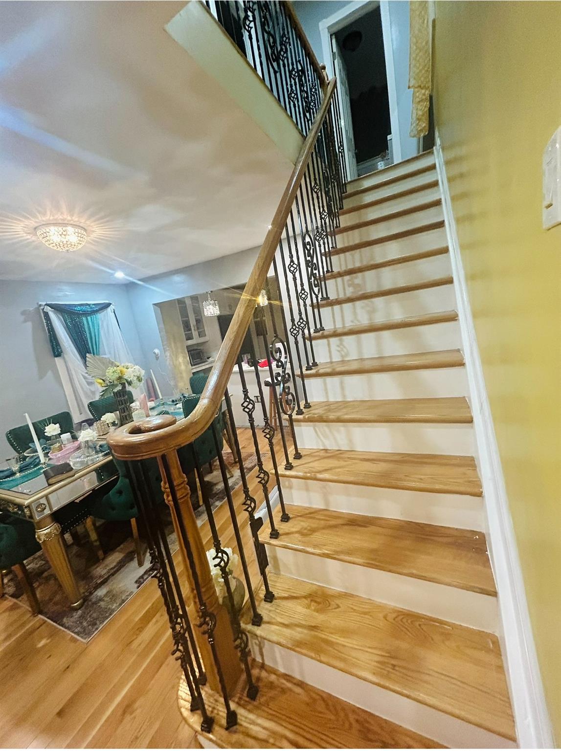 218-34 104th Avenue Queens, NY 11429 - Photo 7 of 27 Staircase with hardwood / wood-style flooring