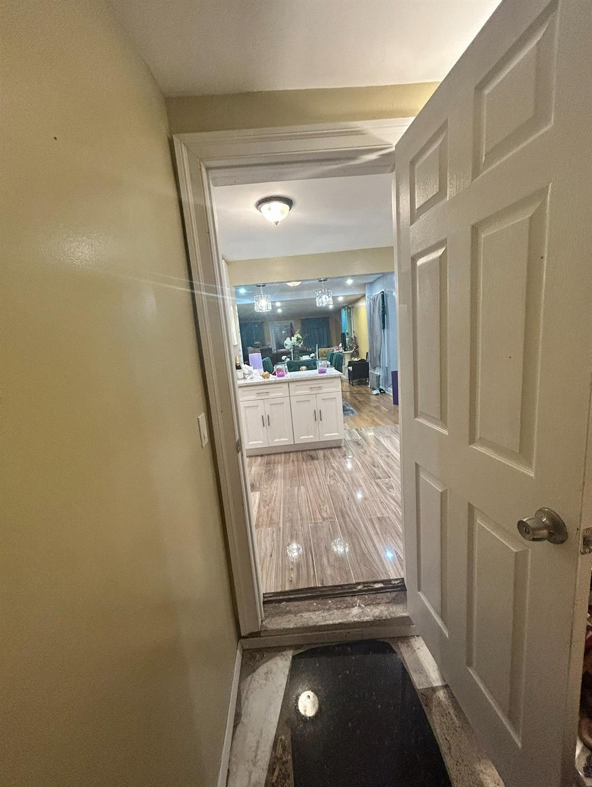 218-34 104th Avenue Queens, NY 11429 - Photo 8 of 27 Doorway featuring light hardwood / wood-style floors