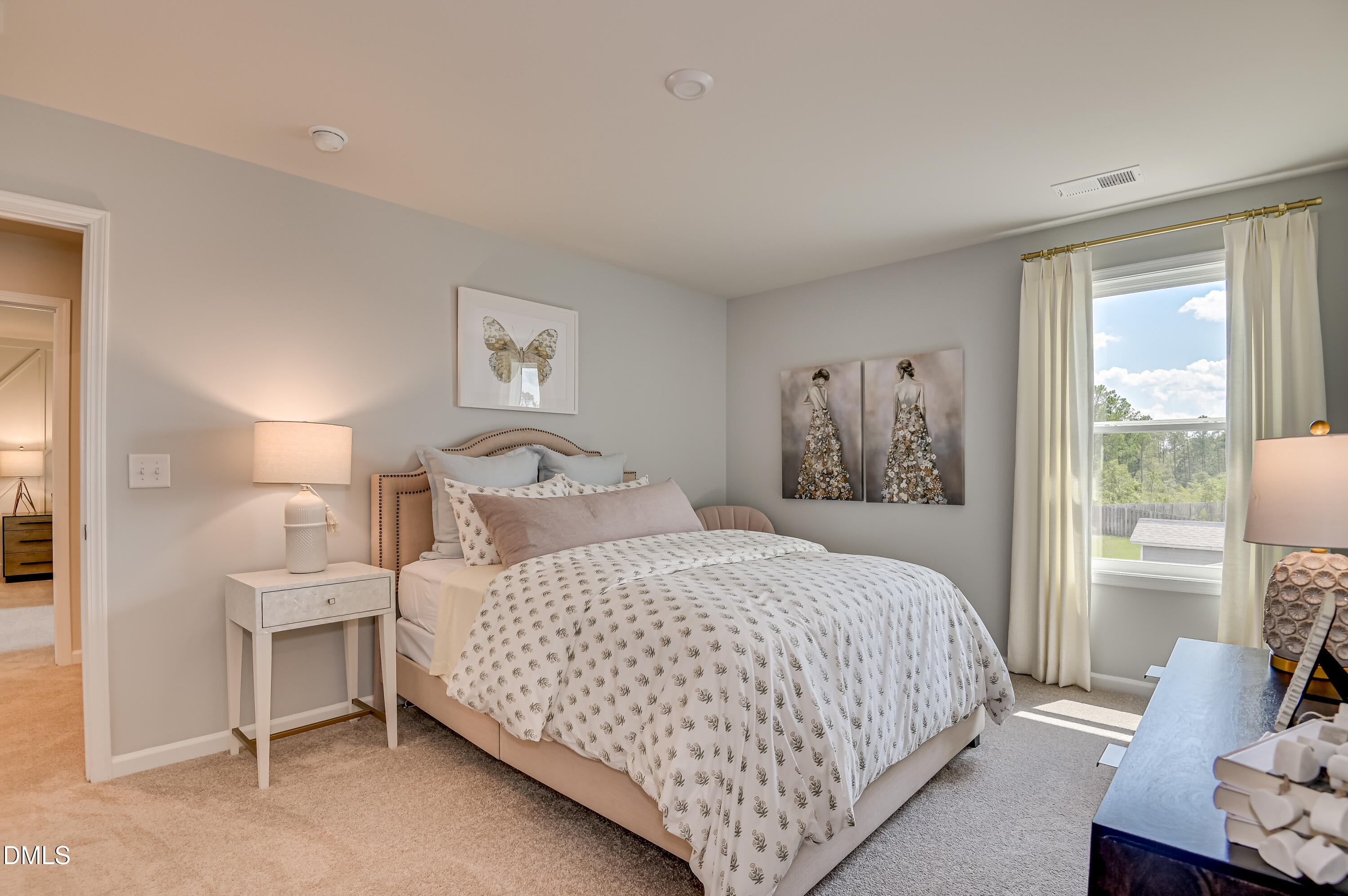 331 Jeter Grove Road Apex, NC 27523 - Photo 10 of 28 a bedroom with a bed and a couch