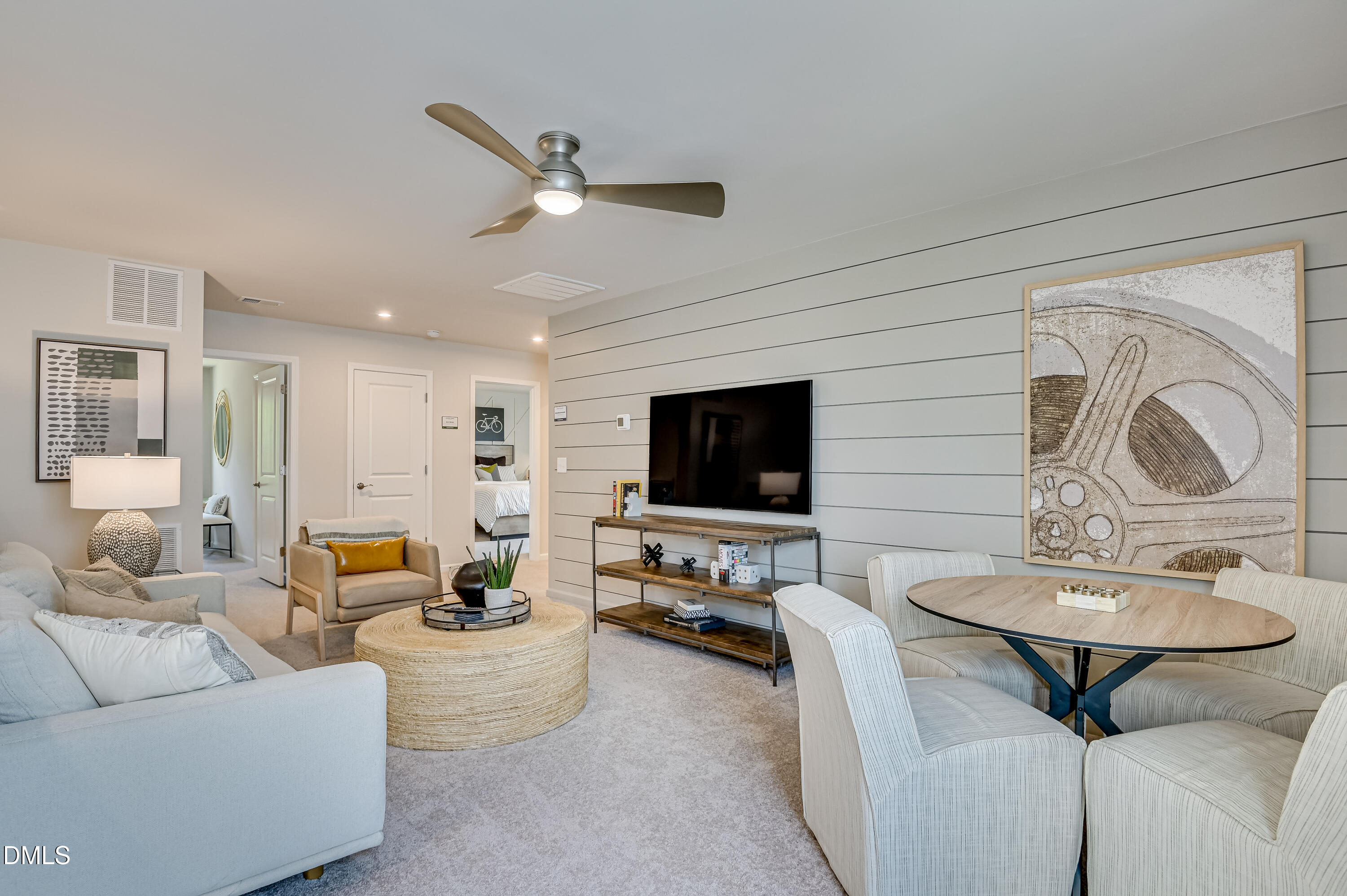 331 Jeter Grove Road Apex, NC 27523 - Photo 5 of 28 a living room with furniture and a flat screen tv