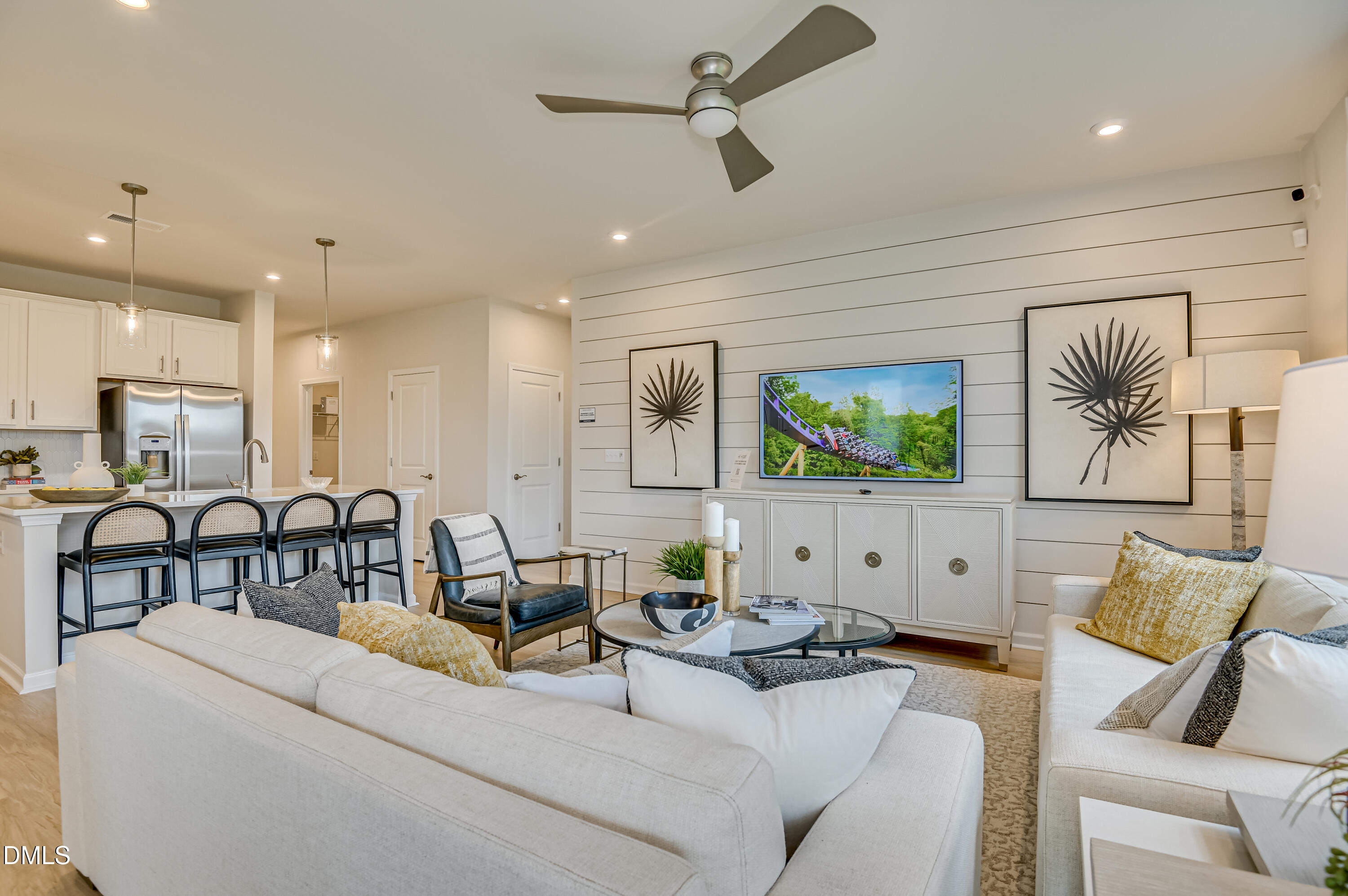 331 Jeter Grove Road Apex, NC 27523 - Photo 7 of 28 a living room with furniture and a flat screen tv