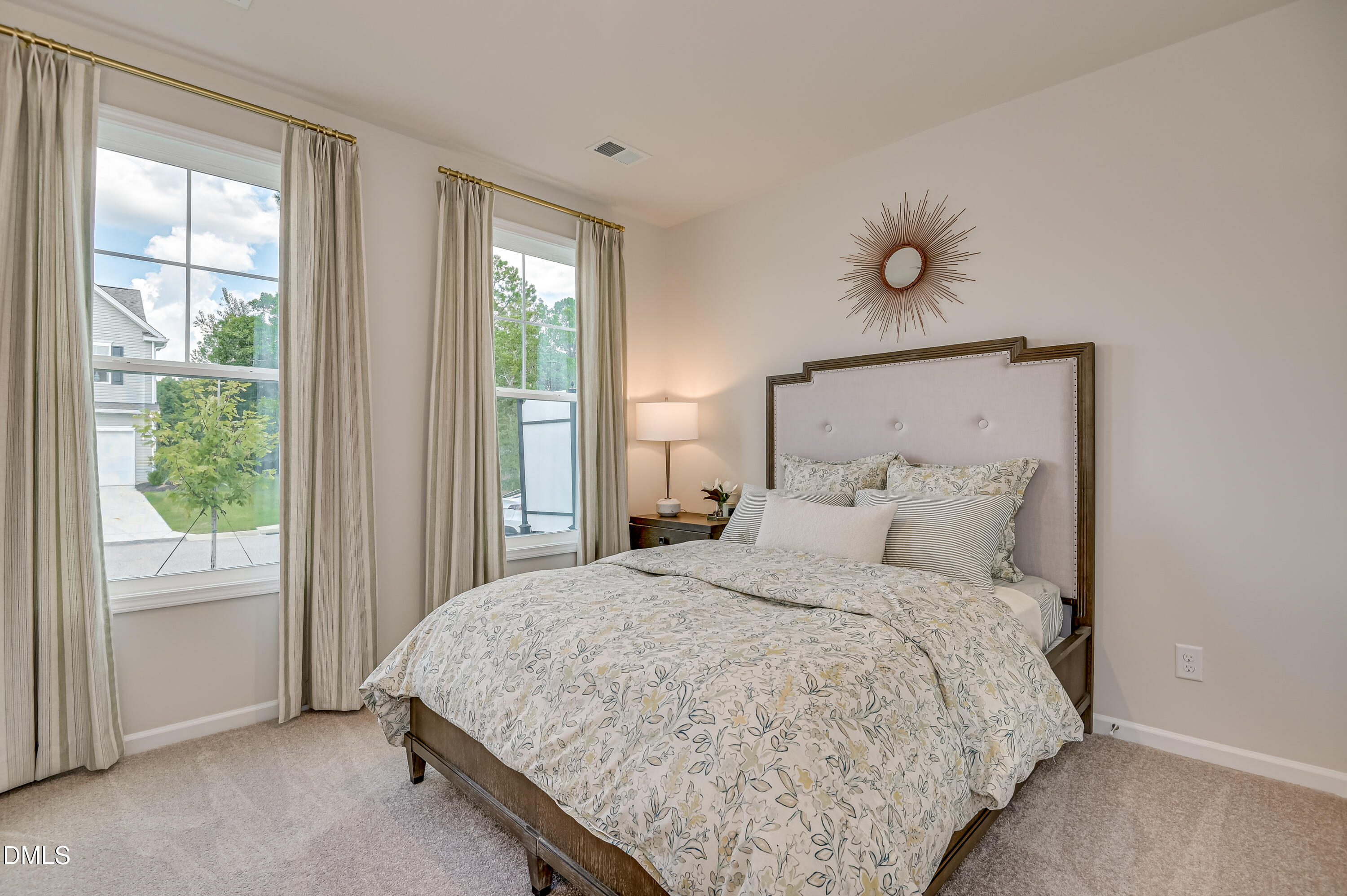 331 Jeter Grove Road Apex, NC 27523 - Photo 9 of 28 a bedroom with a large bed and a window