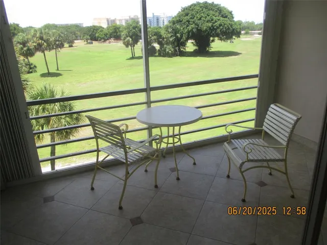 a view of a outdoor space with seating area