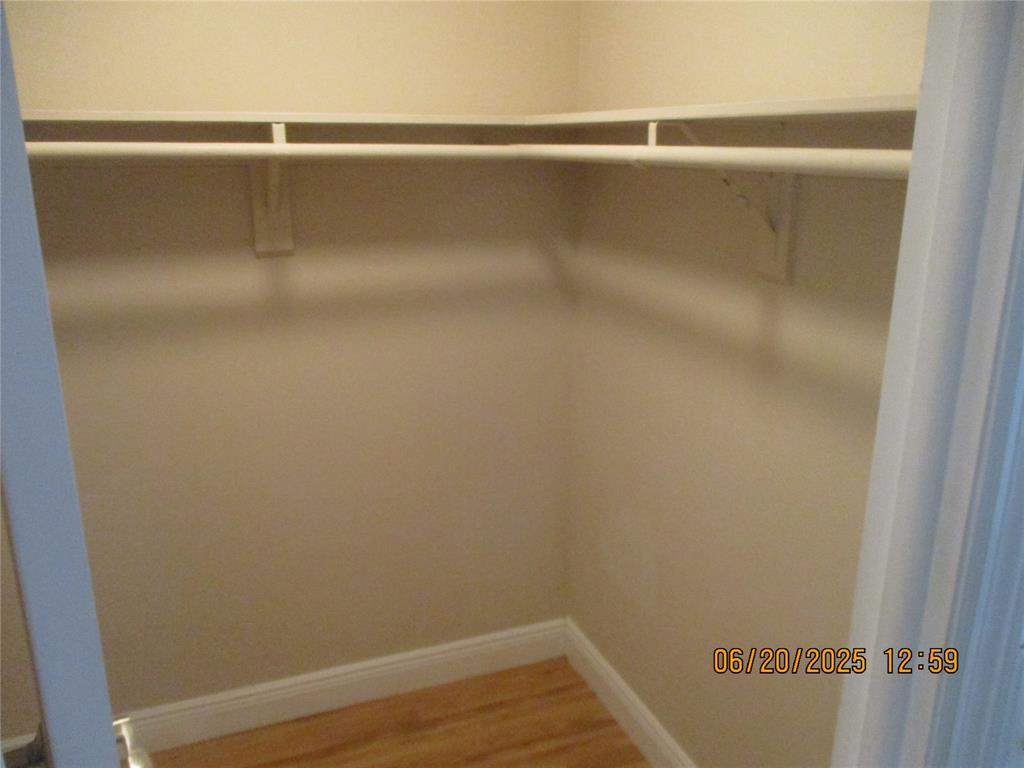 2651 South Course Drive, Unit 404 Pompano Beach, FL 33069 - Photo 20 of 40 a view of a room with wooden floor