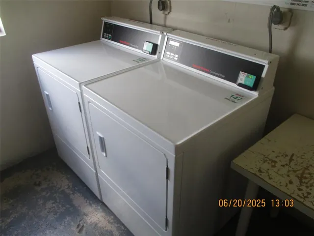 a view of room with a sink and mirror