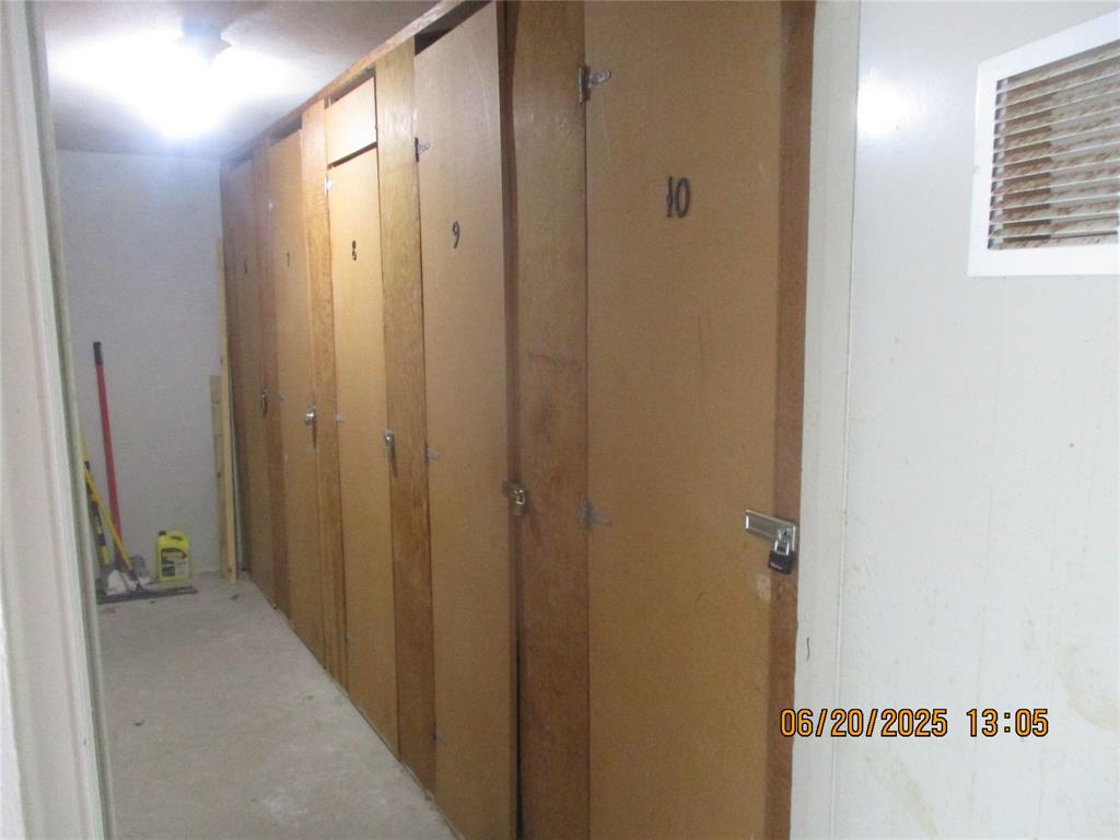 2651 South Course Drive, Unit 404 Pompano Beach, FL 33069 - Photo 31 of 40 a view of room with a sink and mirror