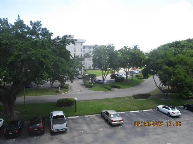 a view of a park and trees
