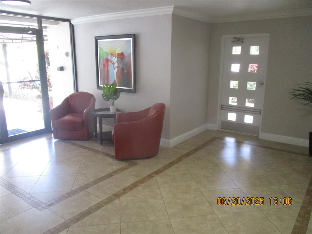2651 South Course Drive, Unit 404 Pompano Beach, FL 33069 - Photo 33 of 40 a view of furniture in a room