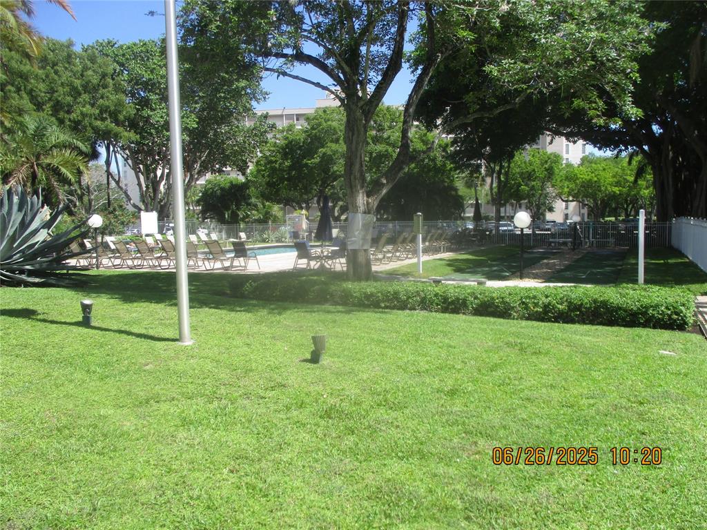 2651 South Course Drive, Unit 404 Pompano Beach, FL 33069 - Photo 38 of 40 a view of a park and trees