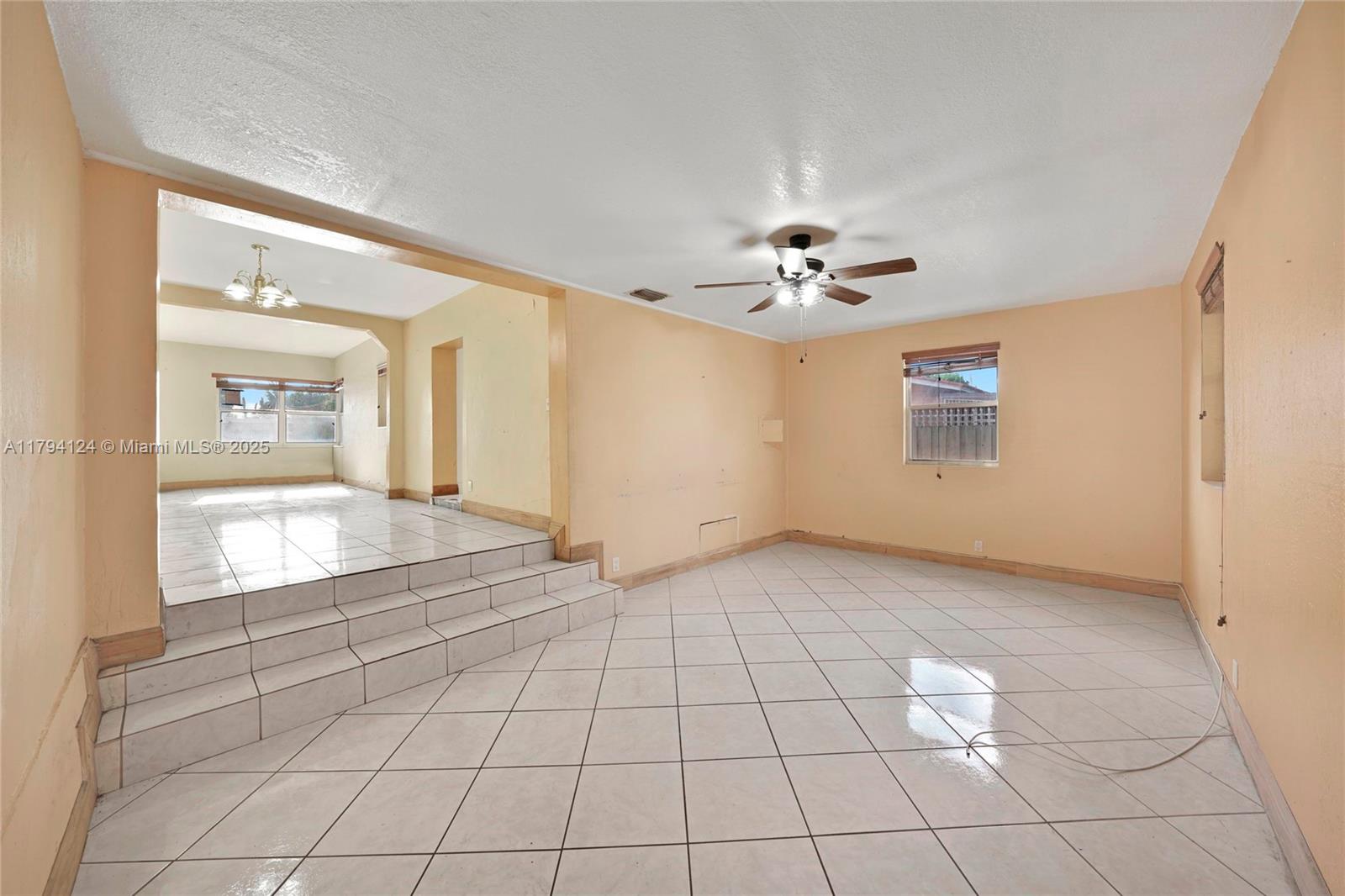 4241 West 1st Avenue Hialeah, FL 33012 - Photo 12 of 33 a view of an empty room with a window