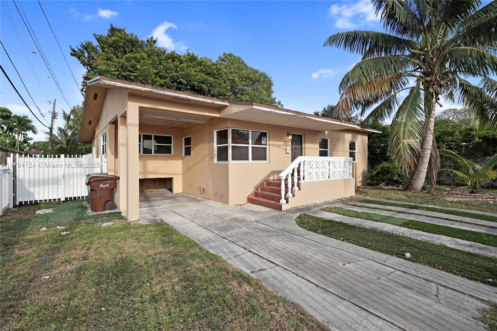4241 West 1st Avenue Hialeah, FL 33012 - Photo 3 of 33 a view of a house with a yard