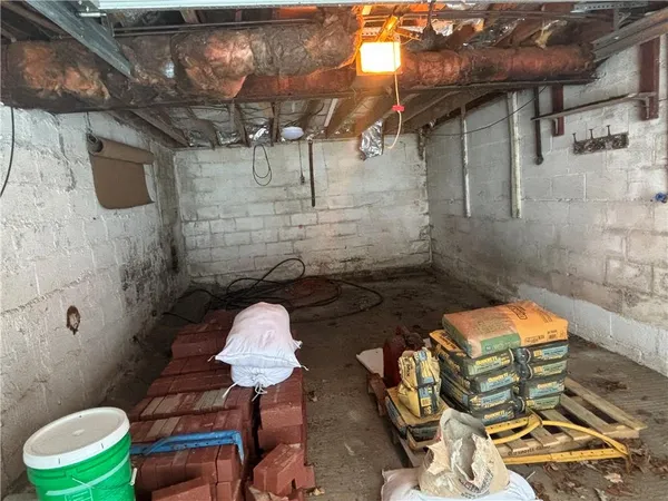 a bathroom with a toilet and shower