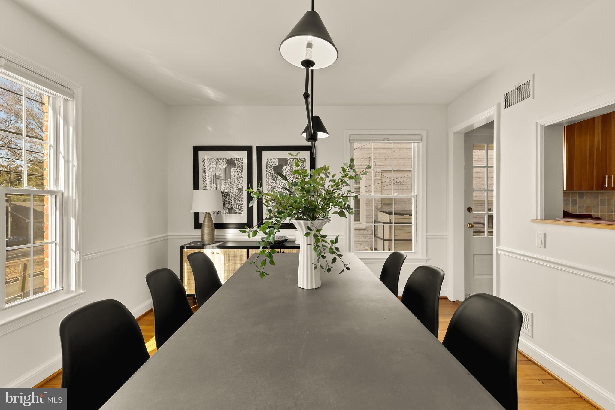 5705 MacArthur Boulevard Northwest Washington, DC 20016 - Photo 13 of 40 a view of a livingroom with furniture and windows