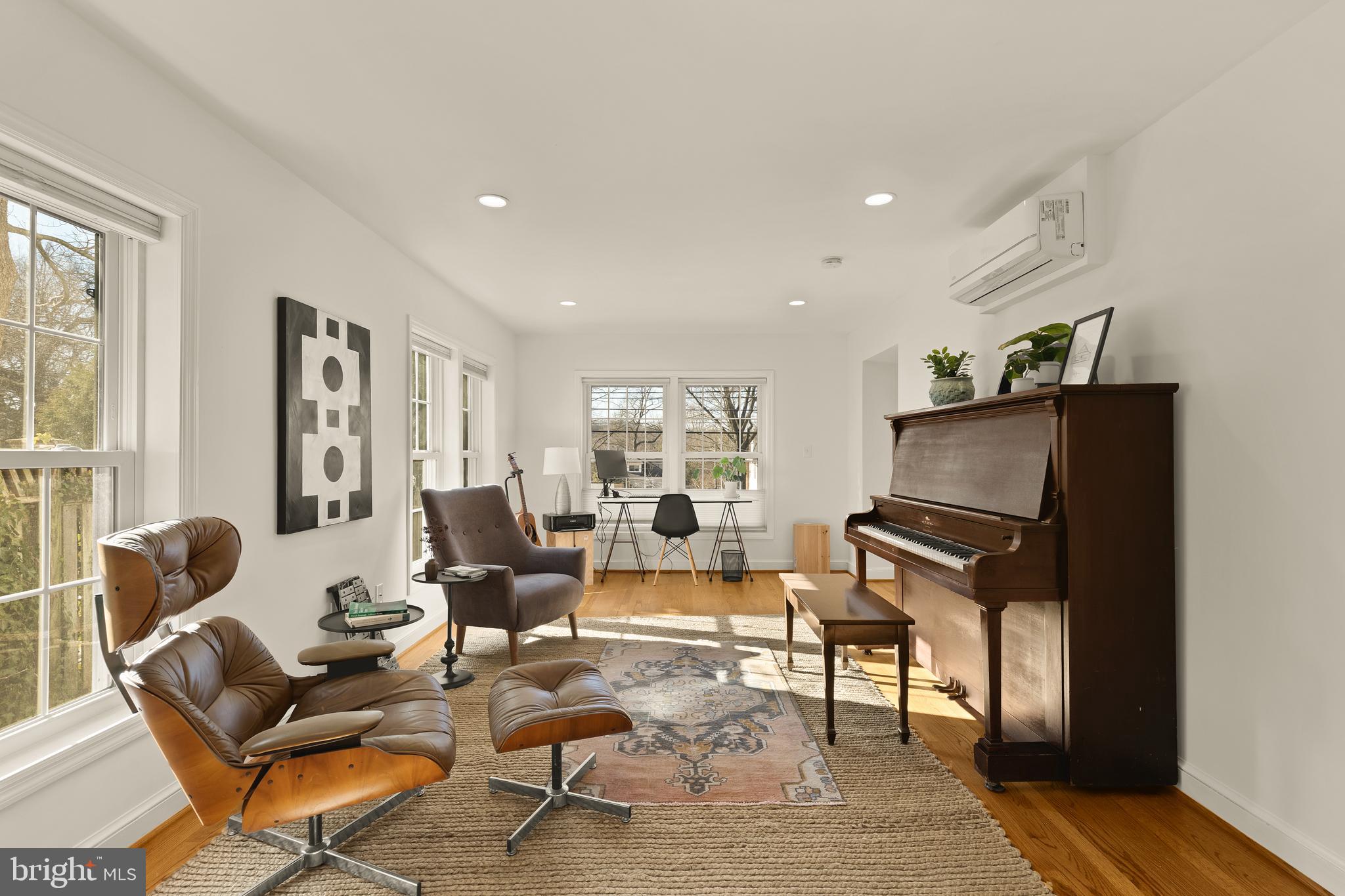 5705 MacArthur Boulevard Northwest Washington, DC 20016 - Photo 16 of 40 a living room with furniture and wooden floor