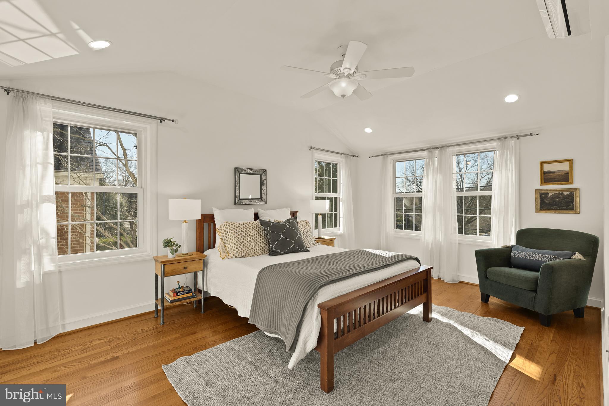 5705 MacArthur Boulevard Northwest Washington, DC 20016 - Photo 19 of 40 a bedroom with a bed couch and window