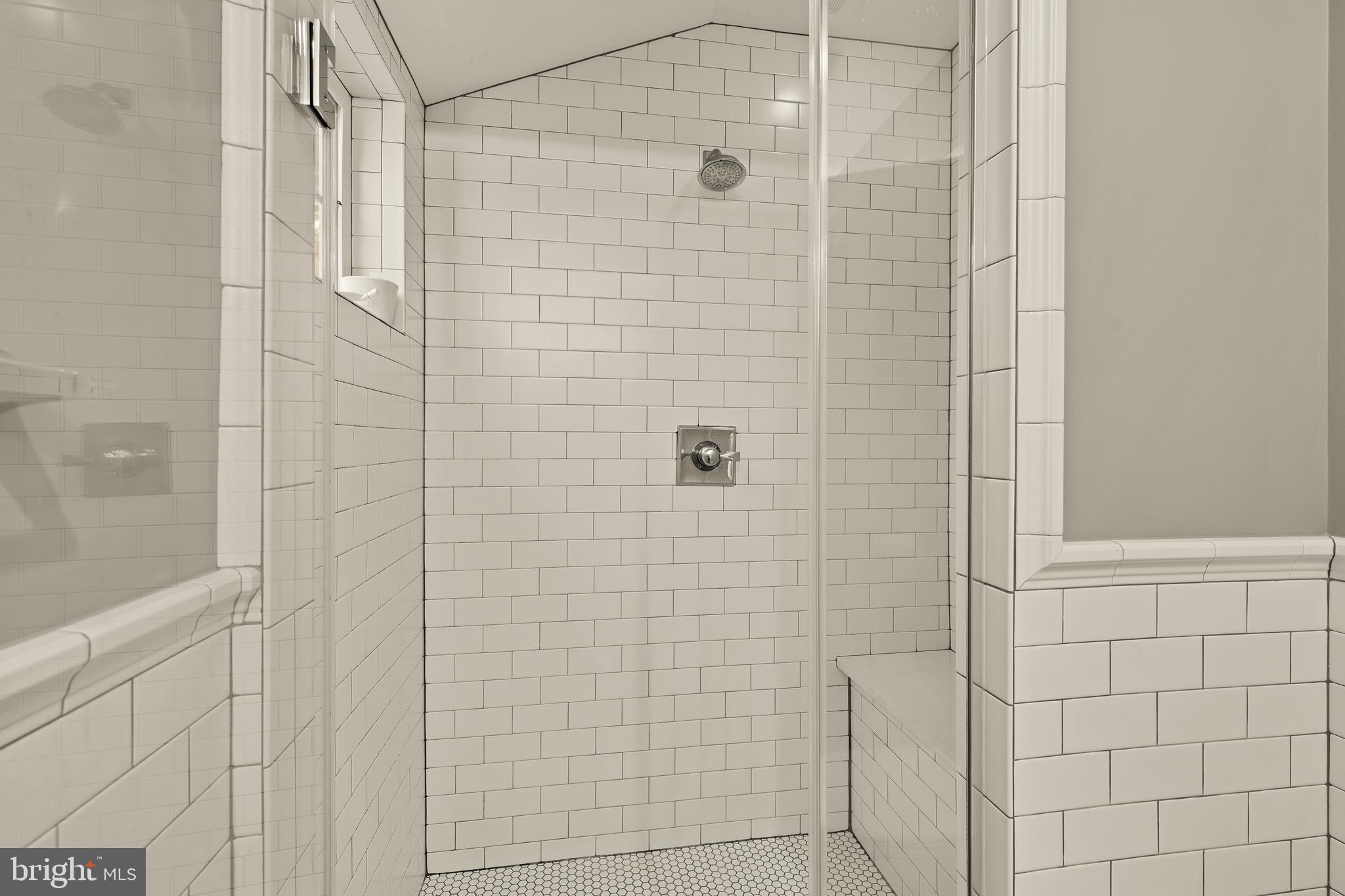 5705 MacArthur Boulevard Northwest Washington, DC 20016 - Photo 21 of 40 a bathroom with a shower