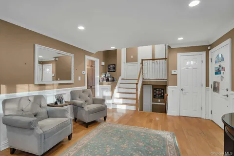 a spacious bedroom with a bed and furniture