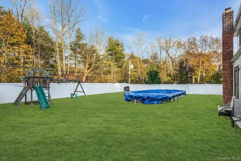 a view of a house with a big yard