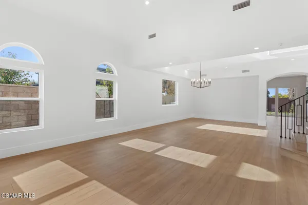 an empty room with windows