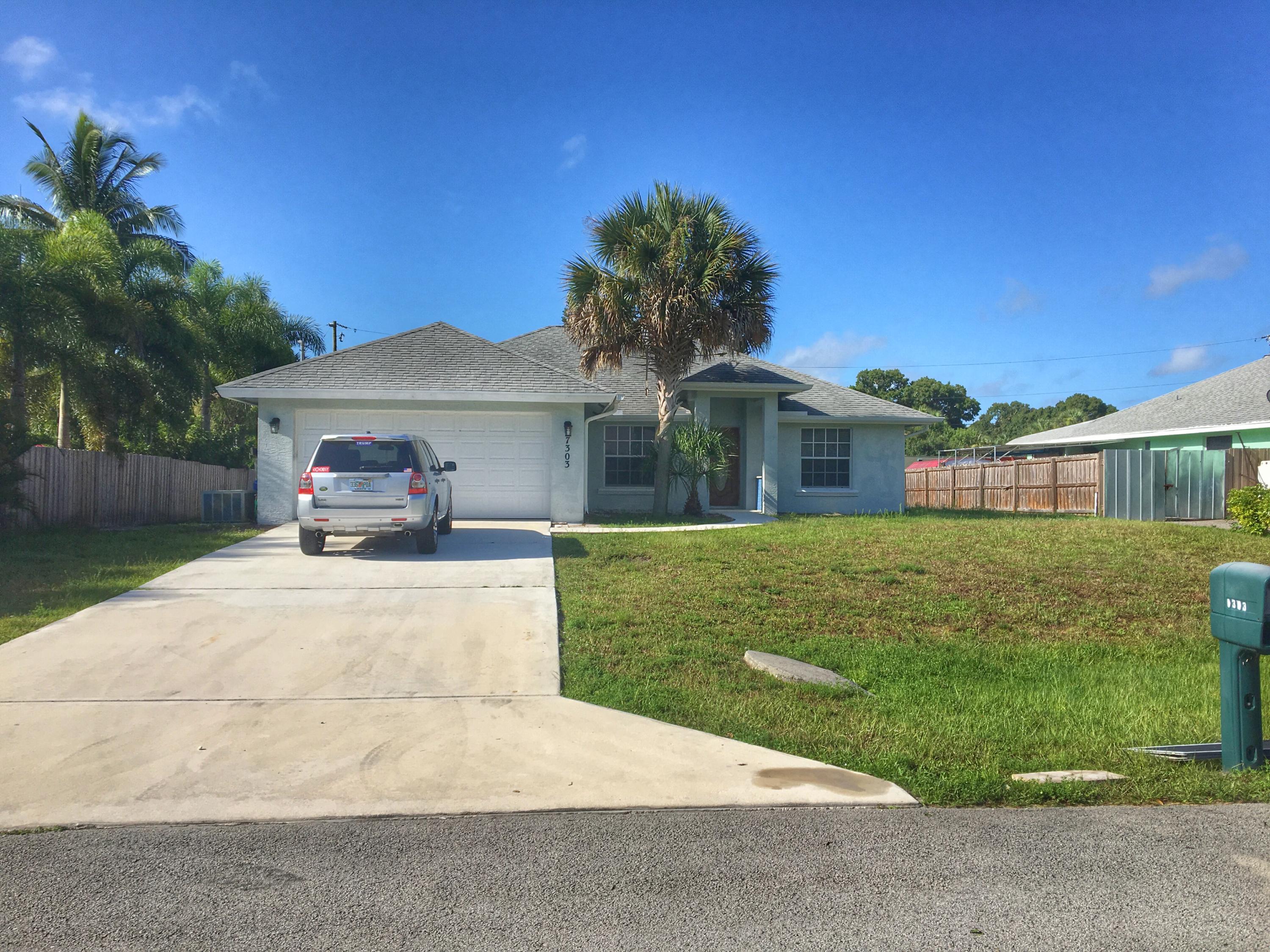 7303 Hibiscus Road Fort Pierce, FL 34951 - Photo 1 of 14 FRONT OF HOME
