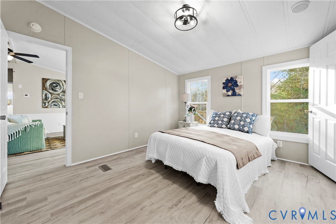 4621 Meherrin Road Meherrin, VA 23954 - Photo 13 of 49 a bedroom with a bed and a window