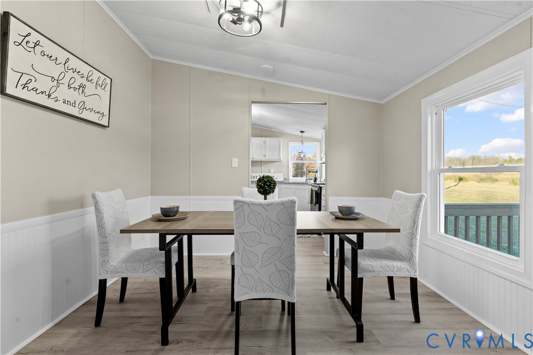 4621 Meherrin Road Meherrin, VA 23954 - Photo 16 of 49 a view of a dining room with furniture and window