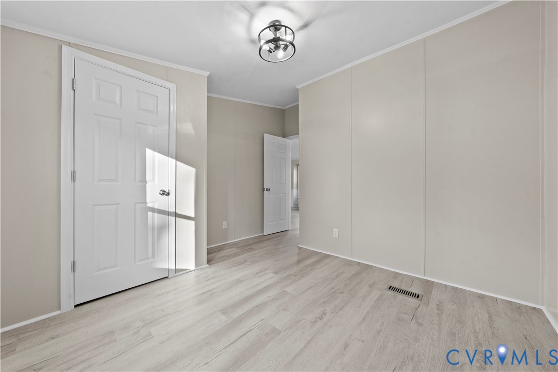 4621 Meherrin Road Meherrin, VA 23954 - Photo 24 of 49 a view of an entryway with wooden floor