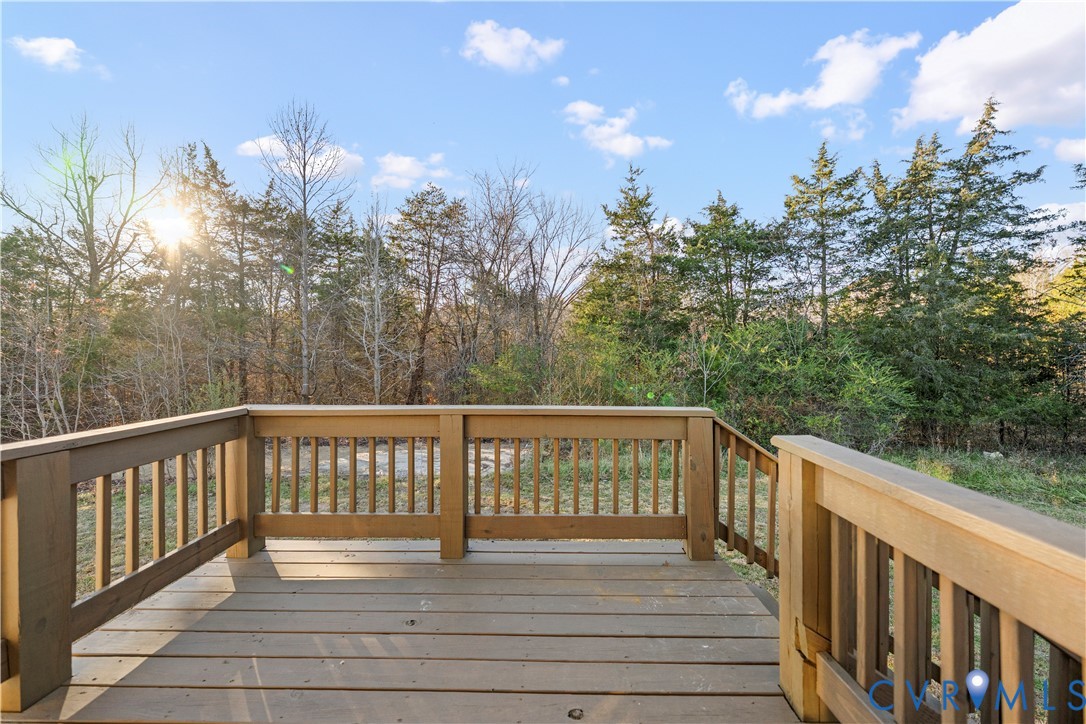 4621 Meherrin Road Meherrin, VA 23954 - Photo 28 of 49 a balcony with wooden floor and fence