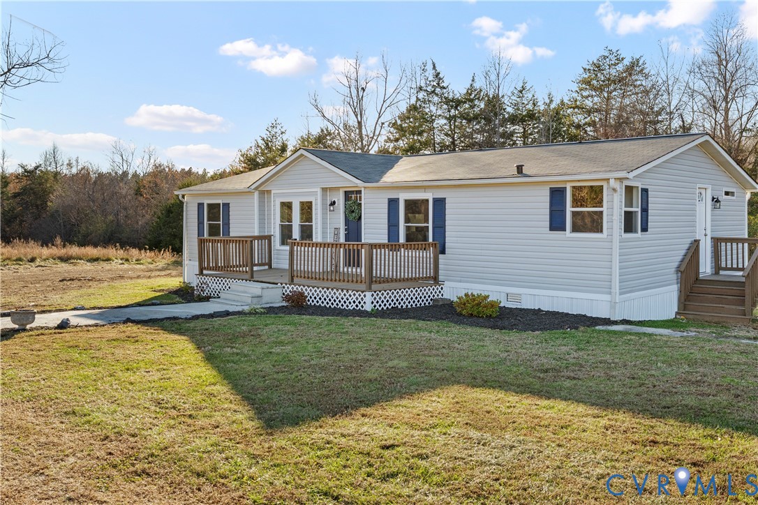 4621 Meherrin Road Meherrin, VA 23954 - Photo 35 of 49 a view of a house with a yard and fence
