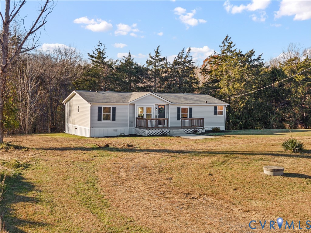 4621 Meherrin Road Meherrin, VA 23954 - Photo 36 of 49 a white house with a large pool and large trees
